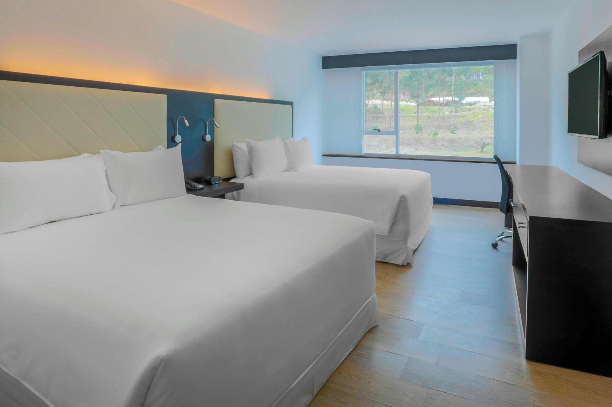 Four Points By Sheraton Cuenca Luaran gambar A typical room at the hotel